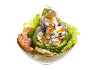 Seafood salad with red caviar in avocado
