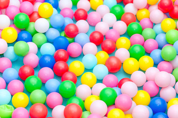 A lot of coloured plastic balls in playroom