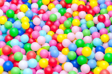 A lot of coloured plastic balls in playroom
