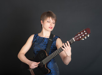 Fototapeta premium girl with an electric guitar