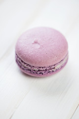 Close-up of lavender flavoured macaron, vertical shot