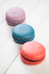Currant, bilberry and lavender flavoured macarons, vertical shot
