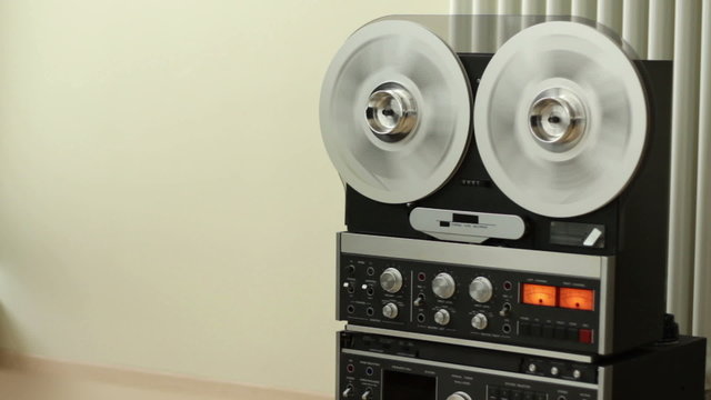 Retro Audio tape recorder rewind the tape