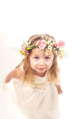 The girl an angel on a white background