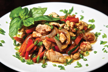 Chicken strips fried with green onion