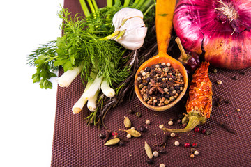 Various spices and herbs, onion and garlik