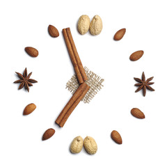 Clock of cinnamon sticks and nuts