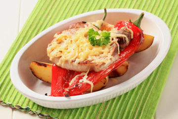 Pork chop with potatoes and red pepper