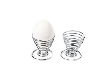 Fototapeta na wymiar Egg in Spiral Silver Egg Cup on White Background