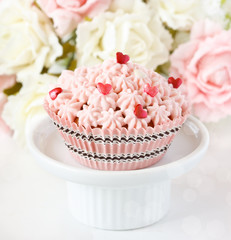 Pink cupcake.