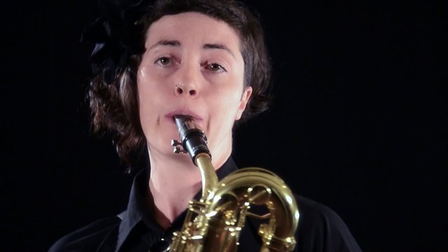 baritone saxophone player, close up