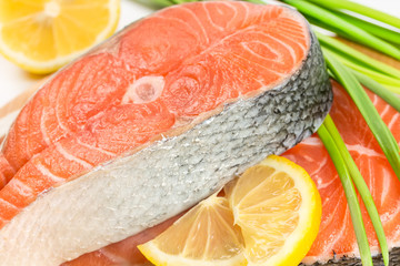 Salmon steak  on a wooden board