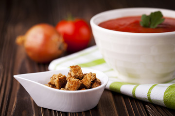 Croutons and red tomato soup