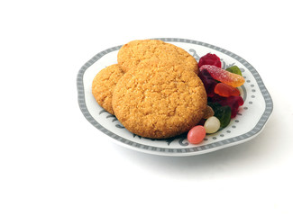 cookies and candied fruit jelly on a plate