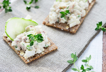 Smoked mackerel pate with herbs on crisp bread