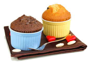 Cupcakes in bowls for baking isolated on white