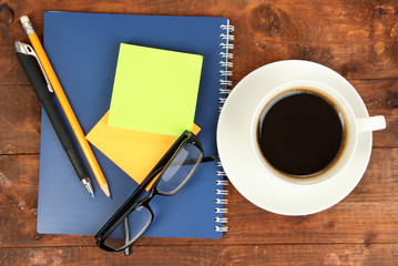 Cup of coffee on worktable close up