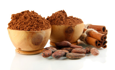 Cocoa powder in wooden bowls and spices, isolated on white