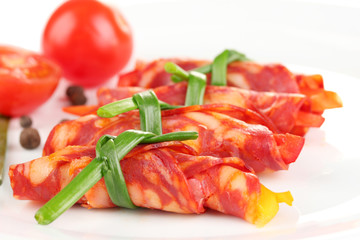 Salami rolls, isolated on white