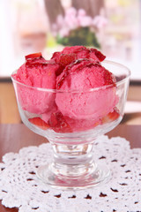 Delicious ice cream on table in room