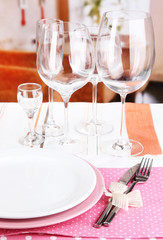 Table setting with glasses for different drinks