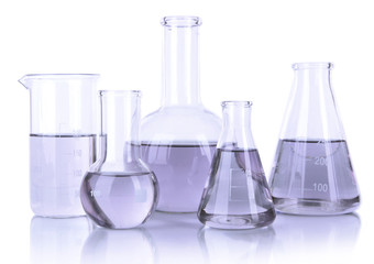 Test-tubes with light purple liquid isolated on white