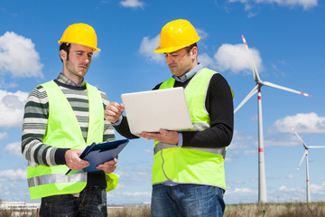 Two Engineers in a Wind Turbine Power Station