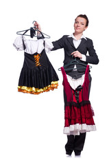 Woman trying to choose dress on white