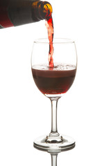 Red wine poured in a wine glass
