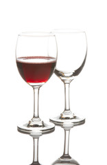 Red wine glass and empty wine glass  isolated