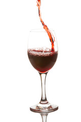 Red wine poured in a wine glass