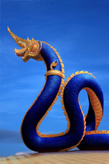 Naga statue of thailand with nice sky