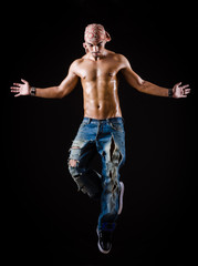 Dancer dancing in the dark studio