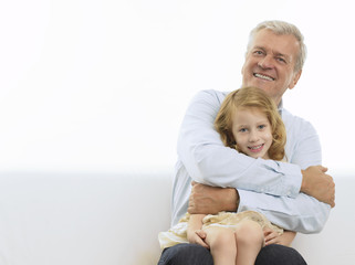 Smiling Grandfather & Granddaughter