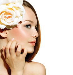Naklejka premium Beauty Girl. Beautiful Model with Rose Flower
