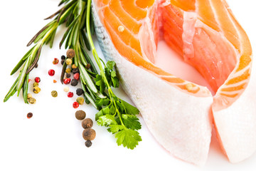 Raw salmon steak with rosemary