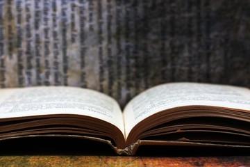 Open book against grunge background