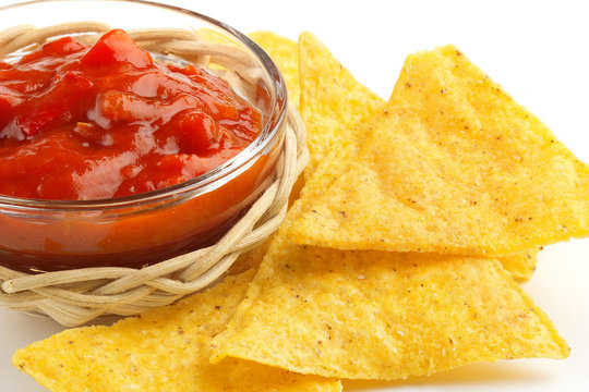 bowl of chili sauce with tortilla chips