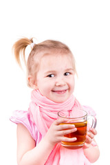 Sick little girl with chickenpox drinking tea with lemon