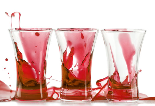 Red Cocktail With Splash Isolated On White