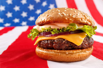 Juicy grilled hamburger on USA flag background - 51414249