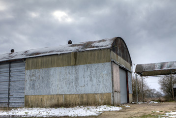 Fototapeta na wymiar farm outbuilding on a stormy day