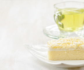 Cup of herbal tea and fresh cake