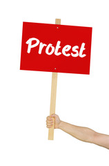 Person hält Schild mit der Aufschrift Protest