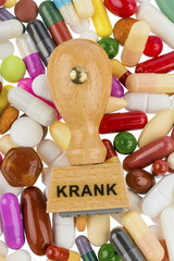 Stempel auf bunten Tabletten