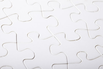 Fototapeta premium Jigsaw puzzle with blank white pieces
