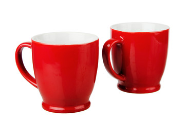 Two red ceramic mug, isolated on white