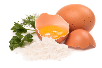 The broken egg on a white background