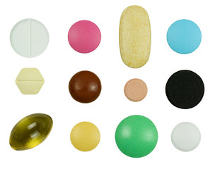 Different colorful pills isolated on white