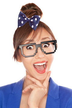 hoto of a funny surprised nerdy girl wearing 8 bit glasses